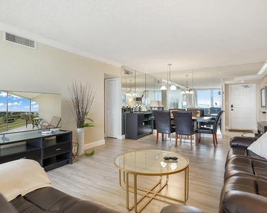 Beautifully remodeled 2BR/2BA top-floor condo in all-age Palm on  in Florida - for sale on GolfHomes.com, golf home, golf lot