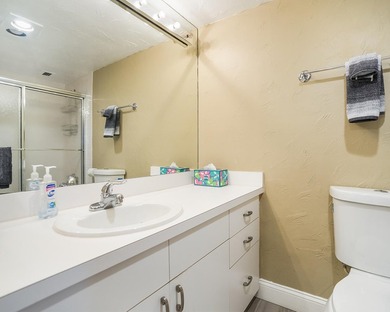 Beautifully remodeled 2BR/2BA top-floor condo in all-age Palm on  in Florida - for sale on GolfHomes.com, golf home, golf lot