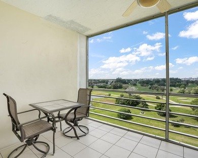 Beautifully remodeled 2BR/2BA top-floor condo in all-age Palm on  in Florida - for sale on GolfHomes.com, golf home, golf lot