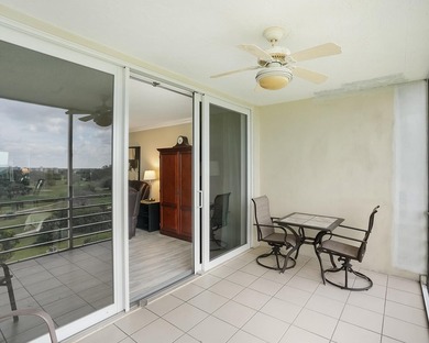 Beautifully remodeled 2BR/2BA top-floor condo in all-age Palm on  in Florida - for sale on GolfHomes.com, golf home, golf lot