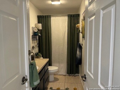 Beautifully maintained immaculate home located on the third hole on Devine Golf Course in Texas - for sale on GolfHomes.com, golf home, golf lot