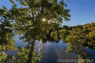 Golfer's Paradise with Breathtaking Views! This spacious condo on Seasons Ridge At Four Seasons in Missouri - for sale on GolfHomes.com, golf home, golf lot