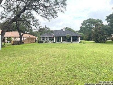 Beautifully maintained immaculate home located on the third hole on Devine Golf Course in Texas - for sale on GolfHomes.com, golf home, golf lot