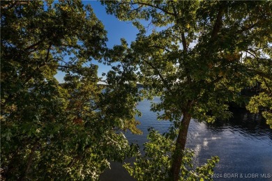 Golfer's Paradise with Breathtaking Views! This spacious condo on Seasons Ridge At Four Seasons in Missouri - for sale on GolfHomes.com, golf home, golf lot