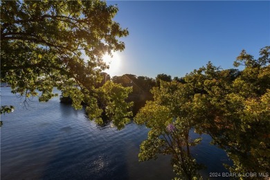 Golfer's Paradise with Breathtaking Views! This spacious condo on Seasons Ridge At Four Seasons in Missouri - for sale on GolfHomes.com, golf home, golf lot