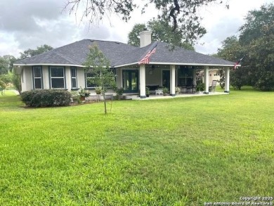 Beautifully maintained immaculate home located on the third hole on Devine Golf Course in Texas - for sale on GolfHomes.com, golf home, golf lot