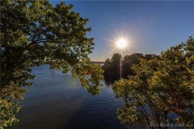 Golfer's Paradise with Breathtaking Views! This spacious condo on Seasons Ridge At Four Seasons in Missouri - for sale on GolfHomes.com, golf home, golf lot