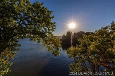 Golfer's Paradise with Breathtaking Views! This spacious condo on Seasons Ridge At Four Seasons in Missouri - for sale on GolfHomes.com, golf home, golf lot