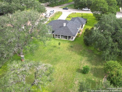 Beautifully maintained immaculate home located on the third hole on Devine Golf Course in Texas - for sale on GolfHomes.com, golf home, golf lot