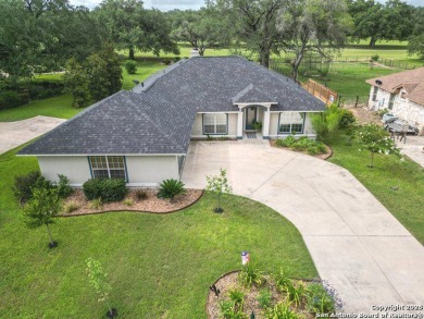 Beautifully maintained immaculate home located on the third hole on Devine Golf Course in Texas - for sale on GolfHomes.com, golf home, golf lot