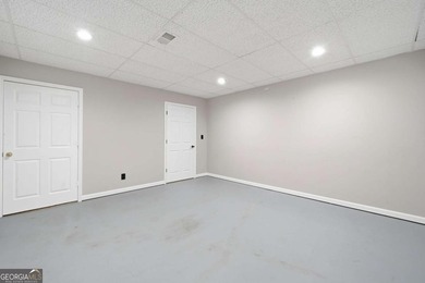 Welcome to this gorgeous traditional home perfectly situated on on Canongate At Eagle Watch Golf Club in Georgia - for sale on GolfHomes.com, golf home, golf lot