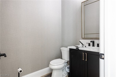 Experience luxury living at its finest in this stunning estate on River Hall Country Club in Florida - for sale on GolfHomes.com, golf home, golf lot