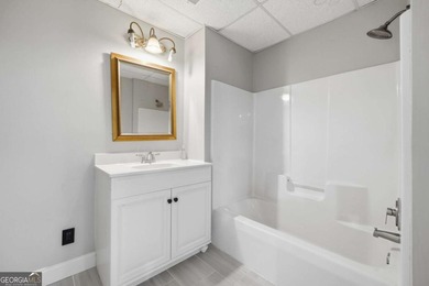 Welcome to this gorgeous traditional home perfectly situated on on Canongate At Eagle Watch Golf Club in Georgia - for sale on GolfHomes.com, golf home, golf lot