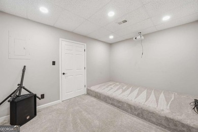 Welcome to this gorgeous traditional home perfectly situated on on Canongate At Eagle Watch Golf Club in Georgia - for sale on GolfHomes.com, golf home, golf lot