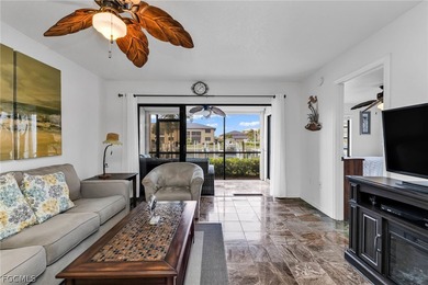 Just steps from your screened lanai to your private dock and on Saint Andrews South Golf Club in Florida - for sale on GolfHomes.com, golf home, golf lot