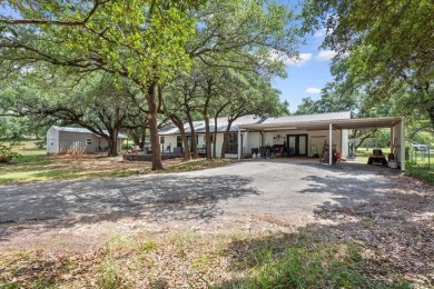 A RARE FIND! Quiet country living in this 4-bed, 3-bath CUSTOM on Lake Whitney Country Club in Texas - for sale on GolfHomes.com, golf home, golf lot