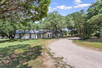 A RARE FIND! Quiet country living in this 4-bed, 3-bath CUSTOM on Lake Whitney Country Club in Texas - for sale on GolfHomes.com, golf home, golf lot