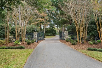 Discover unparalleled luxury in this lakeside private estate on The Dunes Golf and Beach Club in South Carolina - for sale on GolfHomes.com, golf home, golf lot