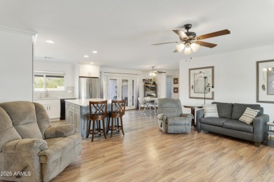 Welcome home to this beautiful located in the gated, guarded 55+ on Fountain of the Sun Country Club in Arizona - for sale on GolfHomes.com, golf home, golf lot