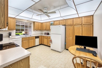 This METICULOUSLY-MAINTAINED *condo-villa* with a BRAND NEW ROOF on Myerlee Country Club in Florida - for sale on GolfHomes.com, golf home, golf lot