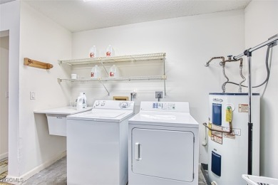 This METICULOUSLY-MAINTAINED *condo-villa* with a BRAND NEW ROOF on Myerlee Country Club in Florida - for sale on GolfHomes.com, golf home, golf lot