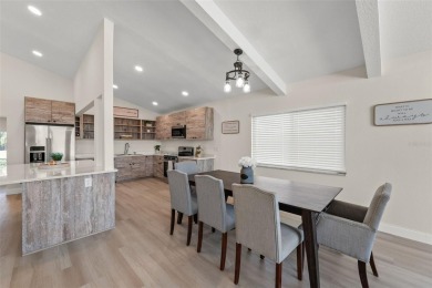 The wait is over, WELCOME HOME!! This gorgeous 4 bedroom, 4 bath on Seminole Lake Country Club in Florida - for sale on GolfHomes.com, golf home, golf lot