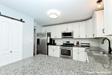 Welcome to this beautifully updated 4-bedroom, 2.5-bath home on Renwood Golf Course in Illinois - for sale on GolfHomes.com, golf home, golf lot
