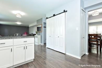 Welcome to this beautifully updated 4-bedroom, 2.5-bath home on Renwood Golf Course in Illinois - for sale on GolfHomes.com, golf home, golf lot