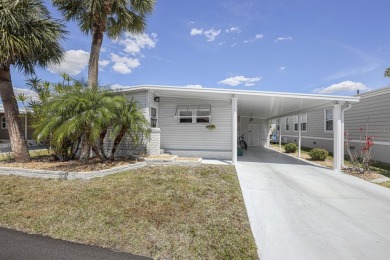 This furnished 2 bedroom, 2 bathroom home is situated on an on Maple Leaf Golf and Country Club in Florida - for sale on GolfHomes.com, golf home, golf lot