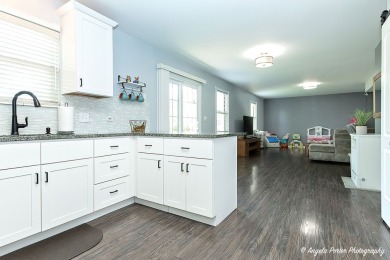 Welcome to this beautifully updated 4-bedroom, 2.5-bath home on Renwood Golf Course in Illinois - for sale on GolfHomes.com, golf home, golf lot