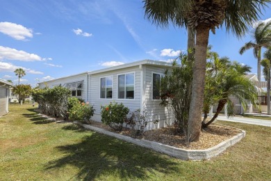 This furnished 2 bedroom, 2 bathroom home is situated on an on Maple Leaf Golf and Country Club in Florida - for sale on GolfHomes.com, golf home, golf lot
