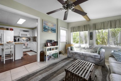 This furnished 2 bedroom, 2 bathroom home is situated on an on Maple Leaf Golf and Country Club in Florida - for sale on GolfHomes.com, golf home, golf lot
