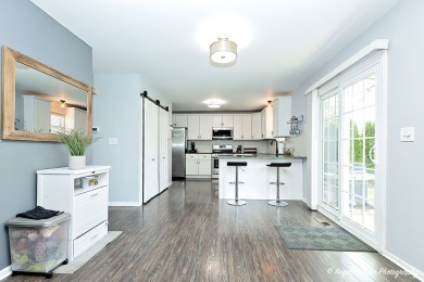 Welcome to this beautifully updated 4-bedroom, 2.5-bath home on Renwood Golf Course in Illinois - for sale on GolfHomes.com, golf home, golf lot