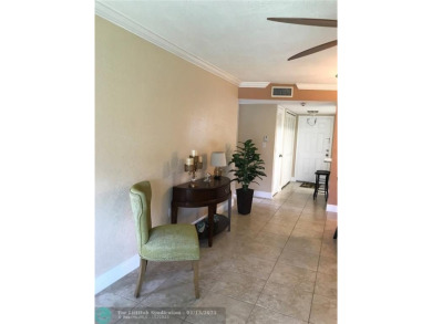 REDUCED FOR FAST SALE. LAKE VIEW!! Remodeled 2/2. CONDO. The on Sunrise Lakes Phase III in Florida - for sale on GolfHomes.com, golf home, golf lot