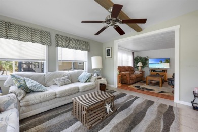 This furnished 2 bedroom, 2 bathroom home is situated on an on Maple Leaf Golf and Country Club in Florida - for sale on GolfHomes.com, golf home, golf lot