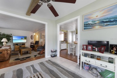 This furnished 2 bedroom, 2 bathroom home is situated on an on Maple Leaf Golf and Country Club in Florida - for sale on GolfHomes.com, golf home, golf lot