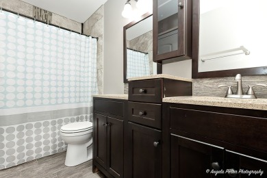 Welcome to this beautifully updated 4-bedroom, 2.5-bath home on Renwood Golf Course in Illinois - for sale on GolfHomes.com, golf home, golf lot