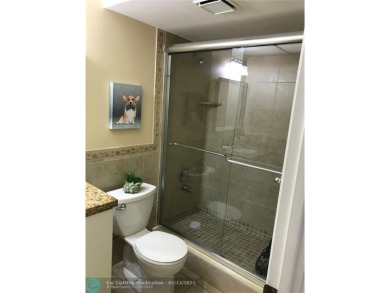 REDUCED FOR FAST SALE. LAKE VIEW!! Remodeled 2/2. CONDO. The on Sunrise Lakes Phase III in Florida - for sale on GolfHomes.com, golf home, golf lot