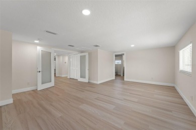 The wait is over, WELCOME HOME!! This gorgeous 4 bedroom, 4 bath on Seminole Lake Country Club in Florida - for sale on GolfHomes.com, golf home, golf lot
