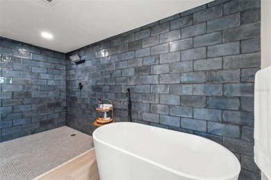 The wait is over, WELCOME HOME!! This gorgeous 4 bedroom, 4 bath on Seminole Lake Country Club in Florida - for sale on GolfHomes.com, golf home, golf lot
