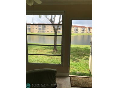REDUCED FOR FAST SALE. LAKE VIEW!! Remodeled 2/2. CONDO. The on Sunrise Lakes Phase III in Florida - for sale on GolfHomes.com, golf home, golf lot