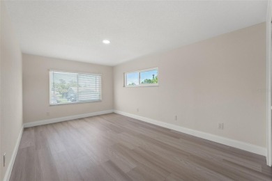 The wait is over, WELCOME HOME!! This gorgeous 4 bedroom, 4 bath on Seminole Lake Country Club in Florida - for sale on GolfHomes.com, golf home, golf lot