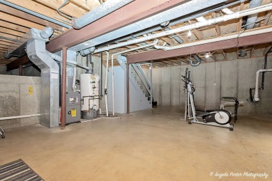 Welcome to this beautifully updated 4-bedroom, 2.5-bath home on Renwood Golf Course in Illinois - for sale on GolfHomes.com, golf home, golf lot