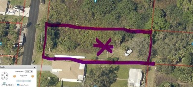 Discover a rare gem in Lehigh Acres, Southwest Florida--a prime on Lehigh Resort Club in Florida - for sale on GolfHomes.com, golf home, golf lot