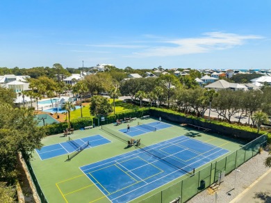 Welcome to your beachside haven at 130 Parkshore Drive. Nestled on Sharks Tooth Golf Club in Florida - for sale on GolfHomes.com, golf home, golf lot