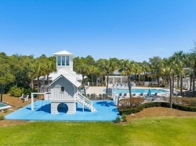 Welcome to your beachside haven at 130 Parkshore Drive. Nestled on Sharks Tooth Golf Club in Florida - for sale on GolfHomes.com, golf home, golf lot