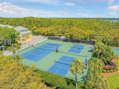 Welcome to your beachside haven at 130 Parkshore Drive. Nestled on Sharks Tooth Golf Club in Florida - for sale on GolfHomes.com, golf home, golf lot