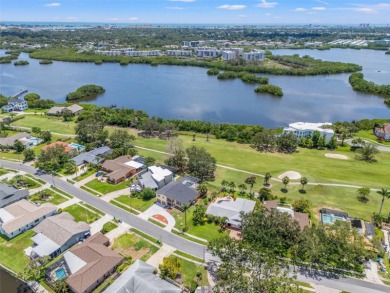 Under contract-accepting backup offers. This gorgeous tri-level on Seminole Lake Country Club in Florida - for sale on GolfHomes.com, golf home, golf lot