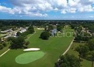 Under contract-accepting backup offers. This gorgeous tri-level on Seminole Lake Country Club in Florida - for sale on GolfHomes.com, golf home, golf lot