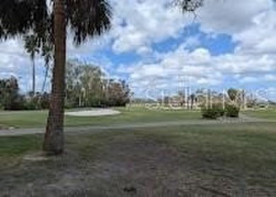 Under contract-accepting backup offers. This gorgeous tri-level on Seminole Lake Country Club in Florida - for sale on GolfHomes.com, golf home, golf lot